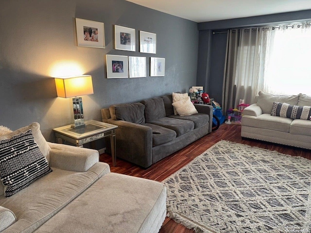 living room featuring dark hardwood / wood-style flooring