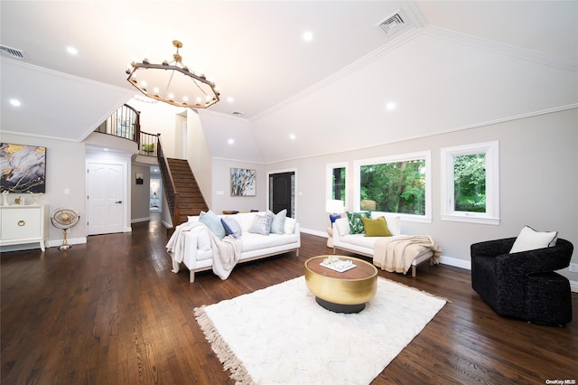 living room featuring an inviting chandelier, dark wood-type flooring, lofted ceiling, and ornamental molding