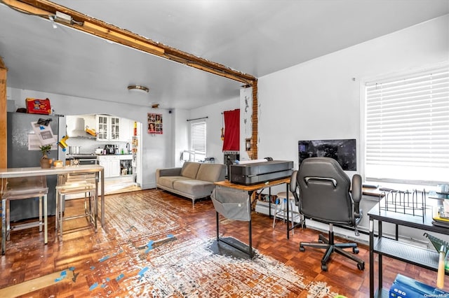 office space with plenty of natural light and parquet flooring