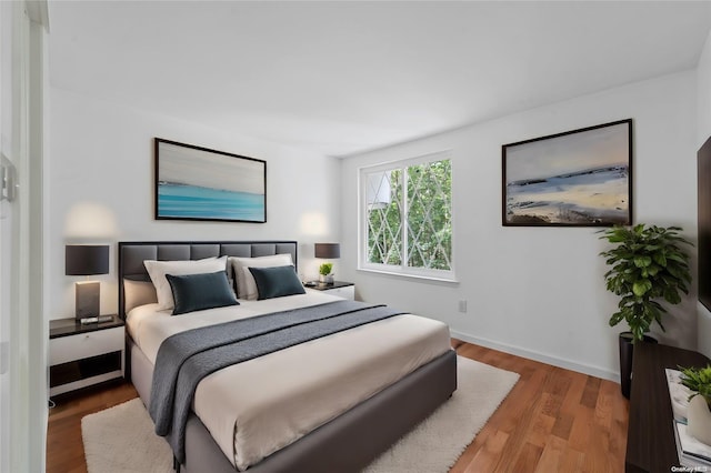 bedroom featuring hardwood / wood-style floors