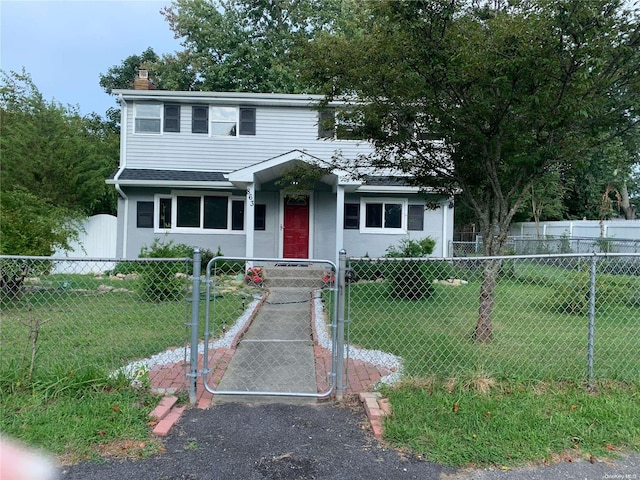 view of front facade with a front lawn