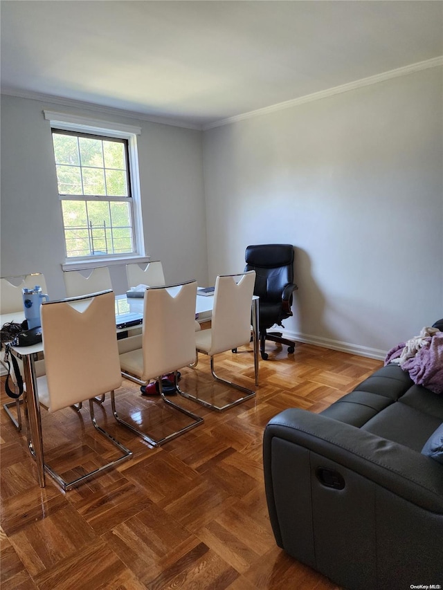 dining room featuring parquet flooring and ornamental molding