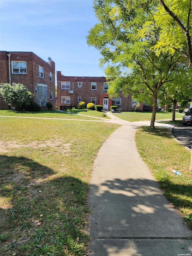 view of community with a yard