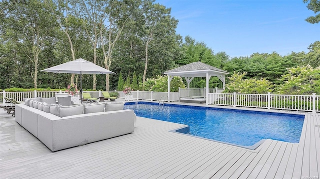 view of swimming pool with a gazebo and an outdoor living space