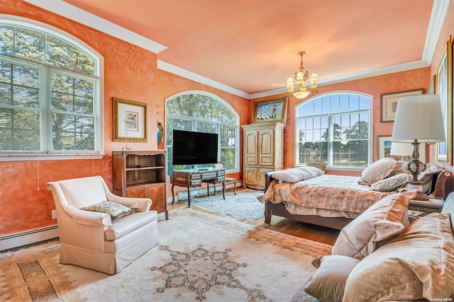 living room with light hardwood / wood-style floors, ornamental molding, a baseboard heating unit, and an inviting chandelier