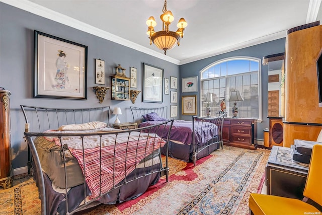 bedroom with a notable chandelier and crown molding