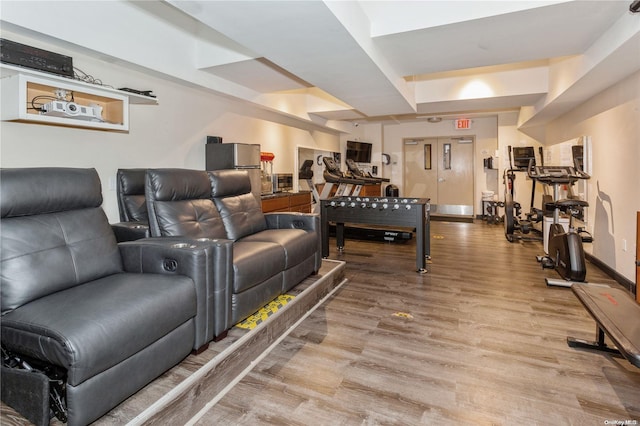 home theater with wood-type flooring