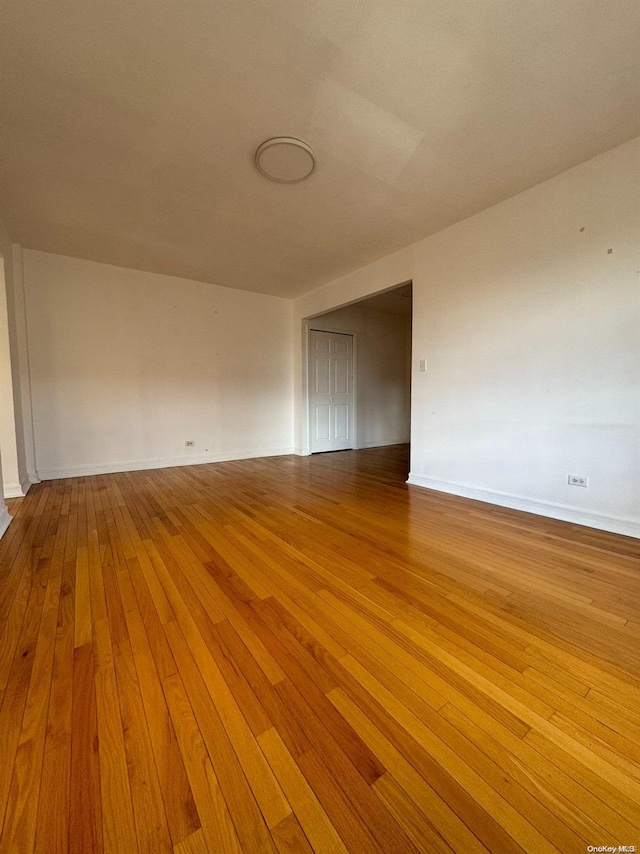 spare room featuring hardwood / wood-style flooring