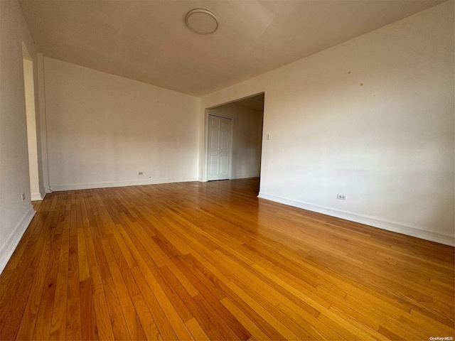 spare room with light hardwood / wood-style flooring