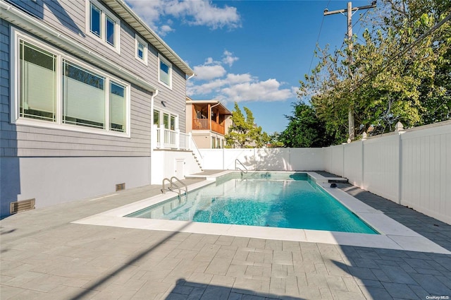 view of pool with a patio