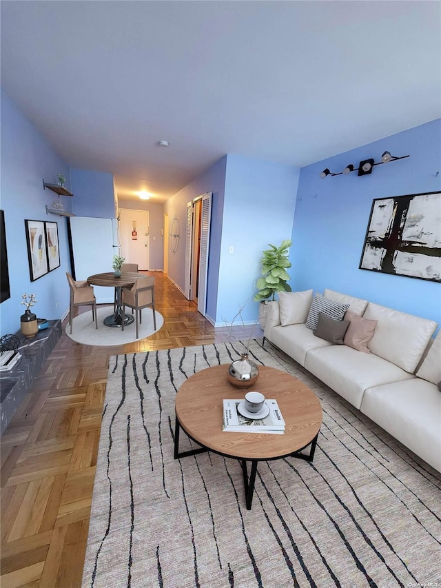 living room with parquet floors