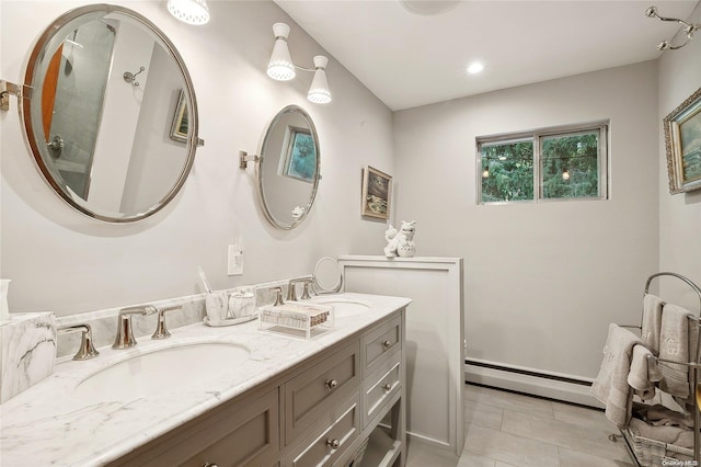 3 Pennington Dr, Huntington, NY 11743 - bathroom with a baseboard radiator, double vanity, and recessed lighting