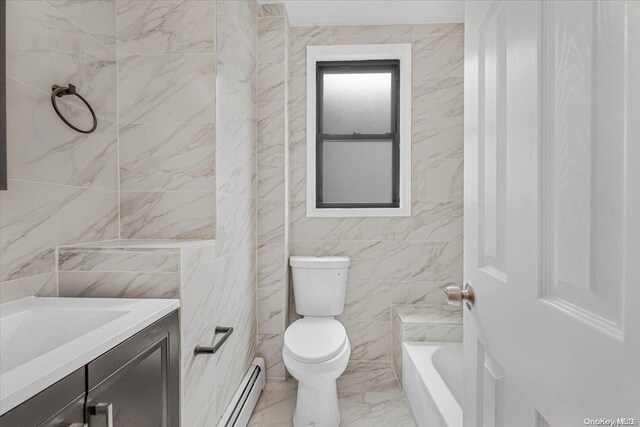 bathroom with a bathing tub, a baseboard radiator, toilet, vanity, and tile walls