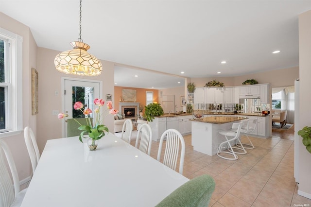 tiled dining area with sink