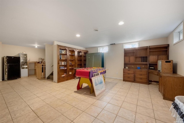 recreation room featuring light tile patterned flooring