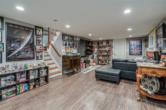 sitting room with hardwood / wood-style flooring