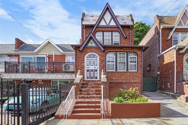 tudor home with a balcony