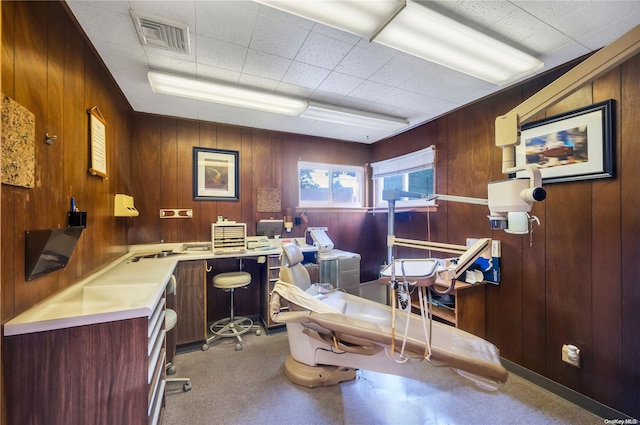 office area featuring wooden walls