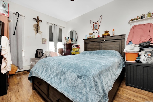 bedroom with light wood-type flooring