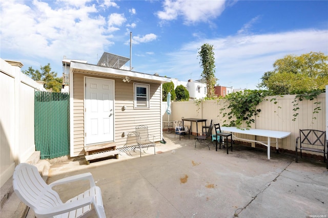 exterior space featuring a shed