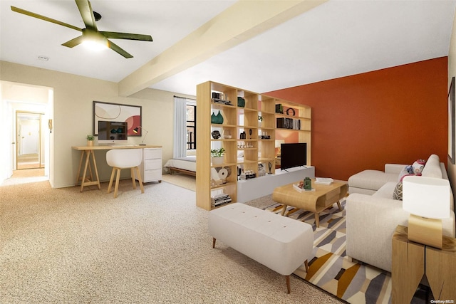 carpeted living room with ceiling fan and beam ceiling