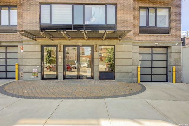 doorway to property featuring french doors