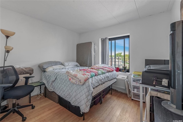 bedroom featuring hardwood / wood-style floors