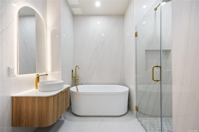 31-16 21st St Unit Ph2C, Astoria, NY 11106 - bathroom featuring vanity, a freestanding bath, and a shower stall