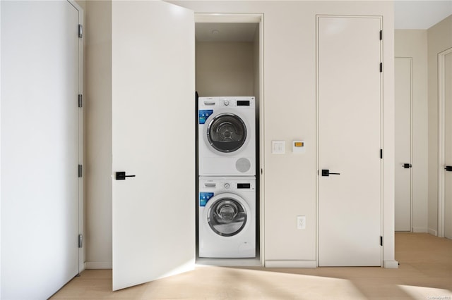 31-16 21st St Unit Ph2C, Astoria, NY 11106 - washroom featuring stacked washer / drying machine