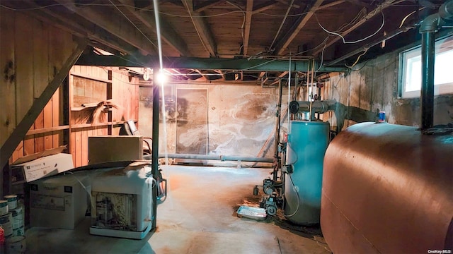 basement featuring water heater