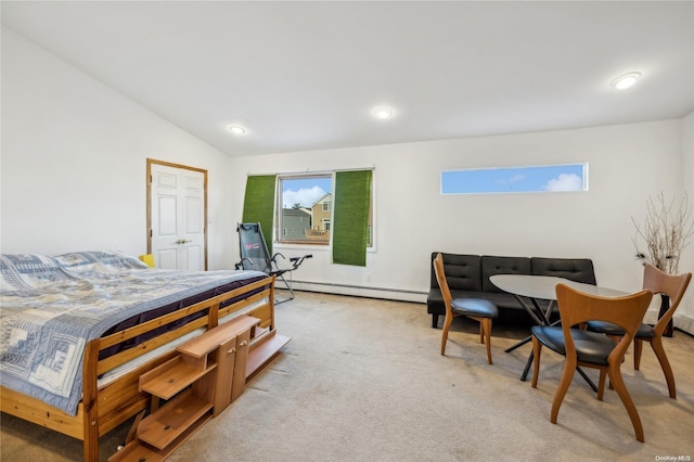 bedroom with light carpet, a baseboard radiator, and vaulted ceiling