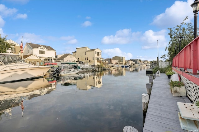 dock area featuring a water view