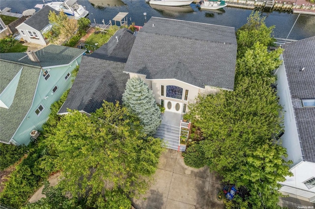 birds eye view of property featuring a water view