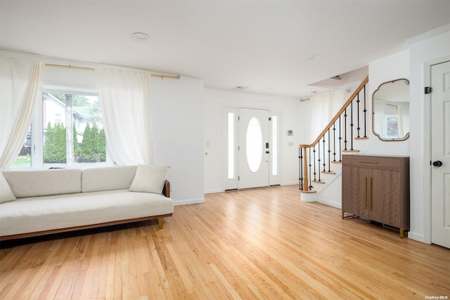 entrance foyer featuring light hardwood / wood-style floors