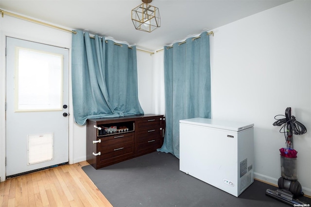 interior space with hardwood / wood-style floors