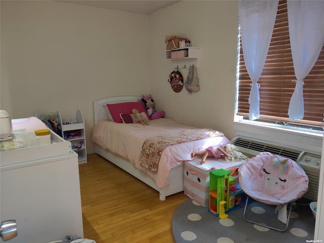 bedroom featuring light hardwood / wood-style floors