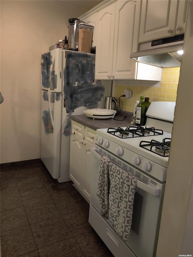 kitchen featuring white appliances, white cabinetry, and backsplash