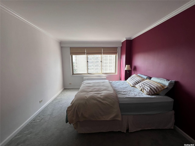 carpeted bedroom with ornamental molding