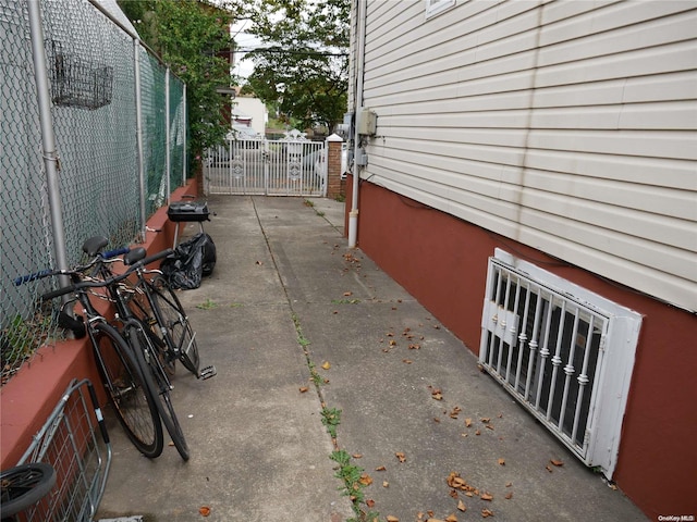 view of side of property with a patio