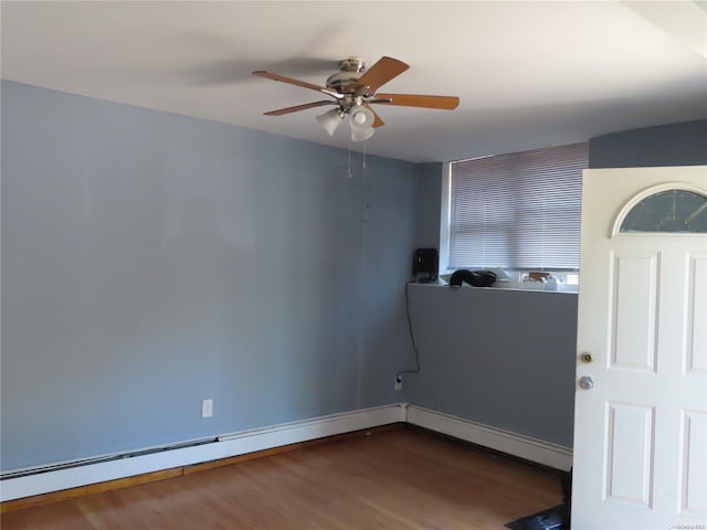 unfurnished room featuring hardwood / wood-style flooring and ceiling fan