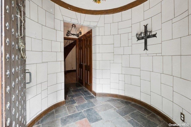 bathroom featuring a notable chandelier