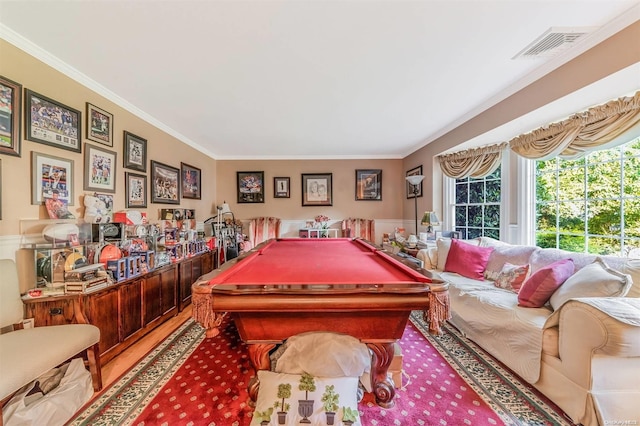 recreation room with ornamental molding and billiards