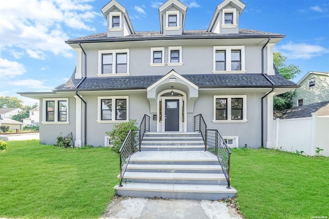 view of front of house with a front lawn