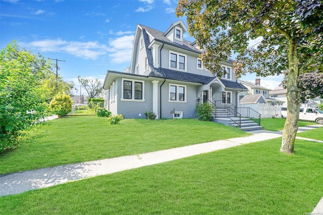 view of front of home featuring a front lawn