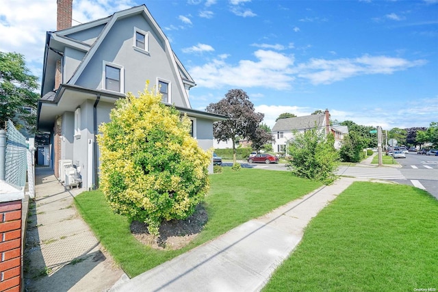 exterior space with a lawn