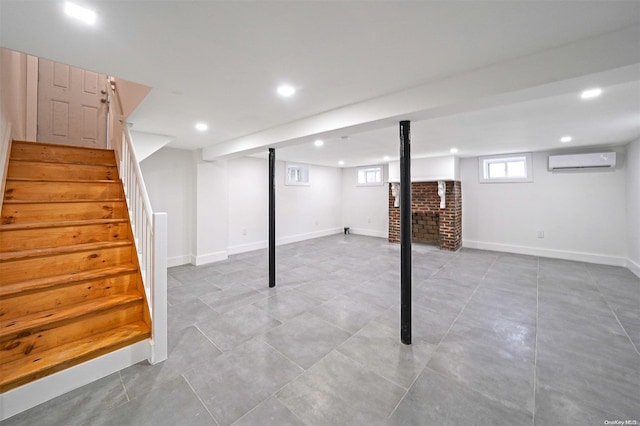 basement with a wall mounted AC