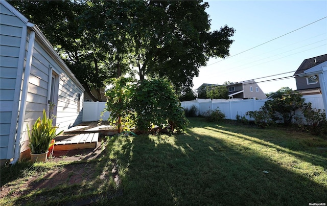 view of yard featuring a wooden deck