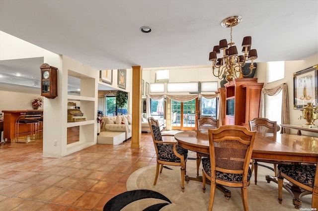 tiled dining room with built in features, french doors, and an inviting chandelier