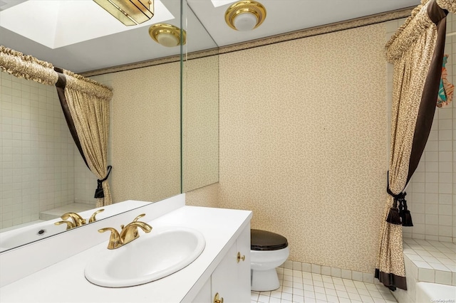 full bathroom with shower / bathtub combination with curtain, tile patterned flooring, vanity, and toilet