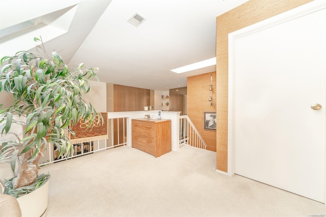 kitchen with light colored carpet